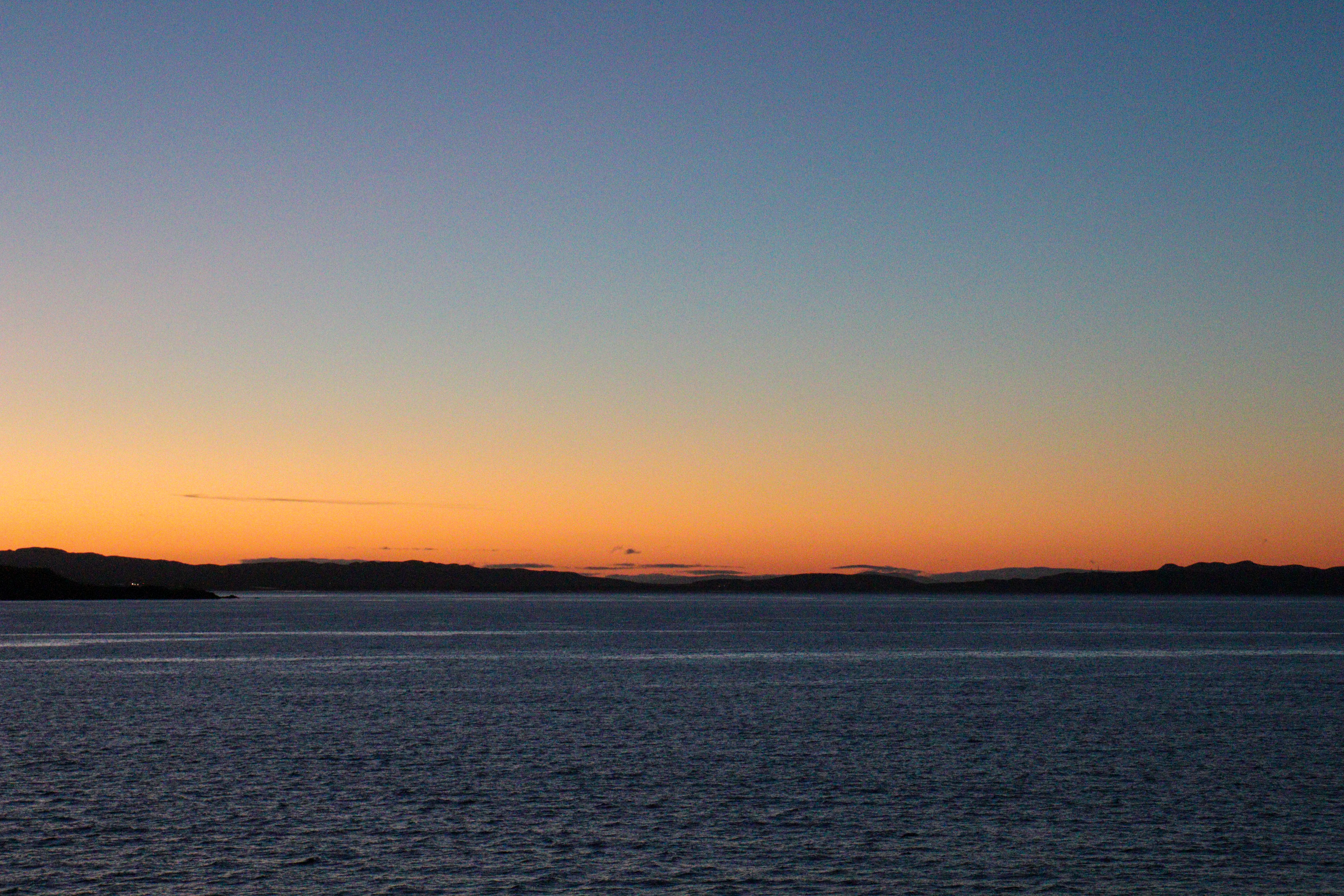 Sunrise over calm sea